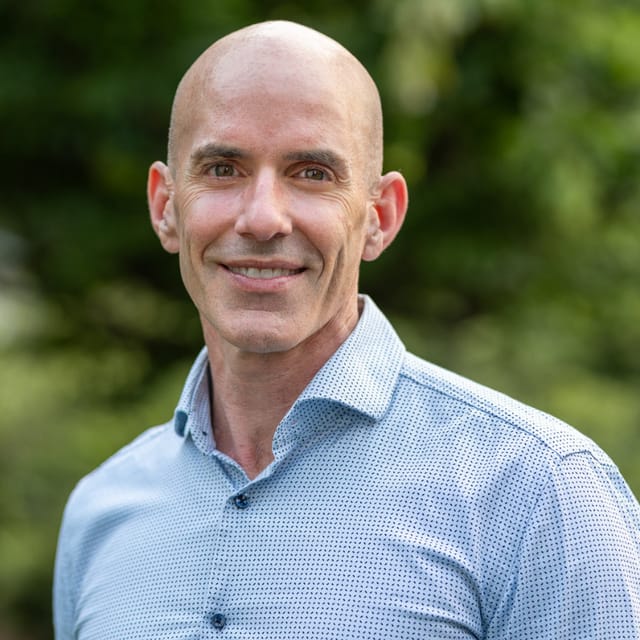 Headshot of Kevin Anthony Fajardo, FAAD, MD, board-certified dermatologist at Forefront Dermatology