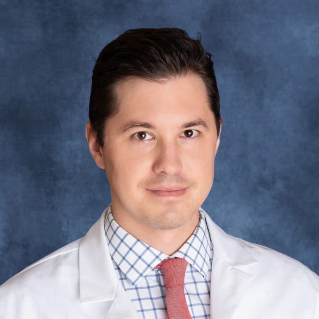 Headshot of Robert Peter Fort III, FAAD, MD, board-certified dermatologist at Forefront Dermatology