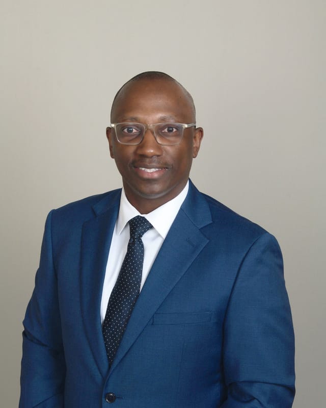 Headshot of Israel Samwel Kasago, MD, board-certified dermatopathologist at Forefront Dermatology