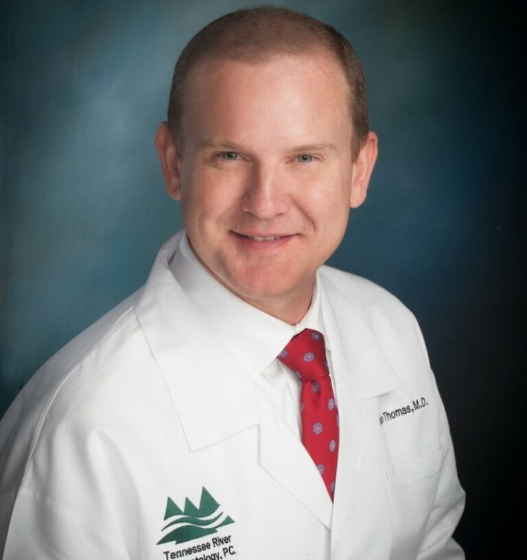 Headshot of Brian Thomas, FAAD, MD, board-certified dermatologist at Tennessee River Dermatology