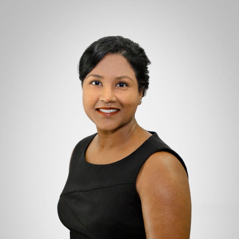 Headshot of Novie Sroa, MD, board-certified dermatologist at Forefront Dermatology