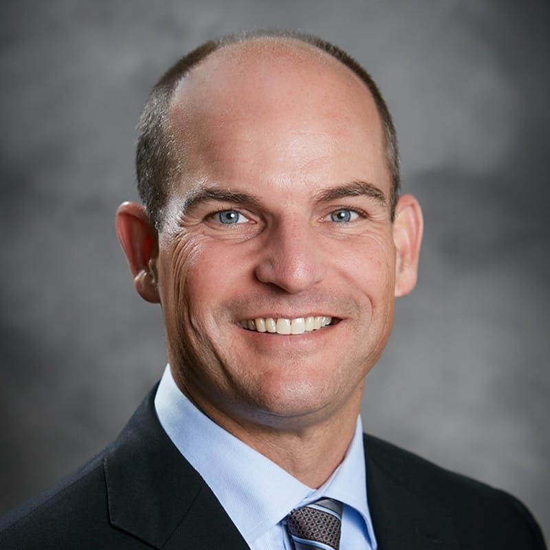 Headshot of J. Mark Jackson, FAAD, MD, board-certified dermatologist at Forefront Dermatology