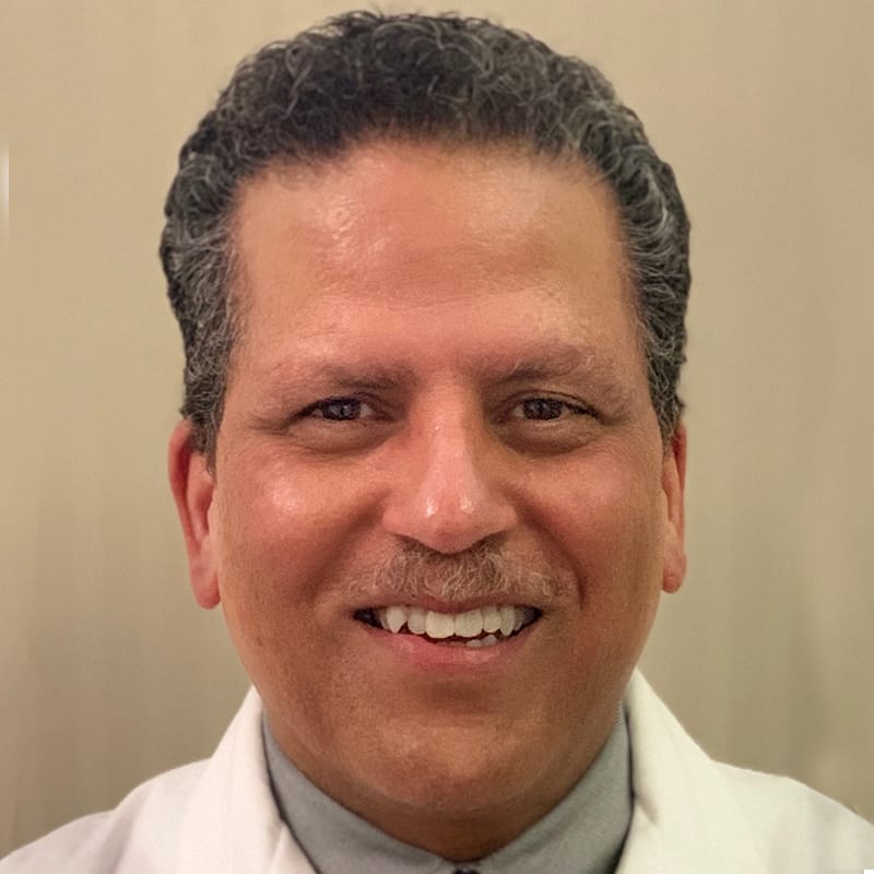Headshot of Karl K. Kellawan, FAAD, MD, board-certified dermatologist at Forefront Dermatology