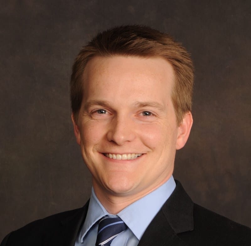 Headshot of Nicholas Uffelmann, FAAD, MD, board-certified dermatologist at Forefront Dermatology