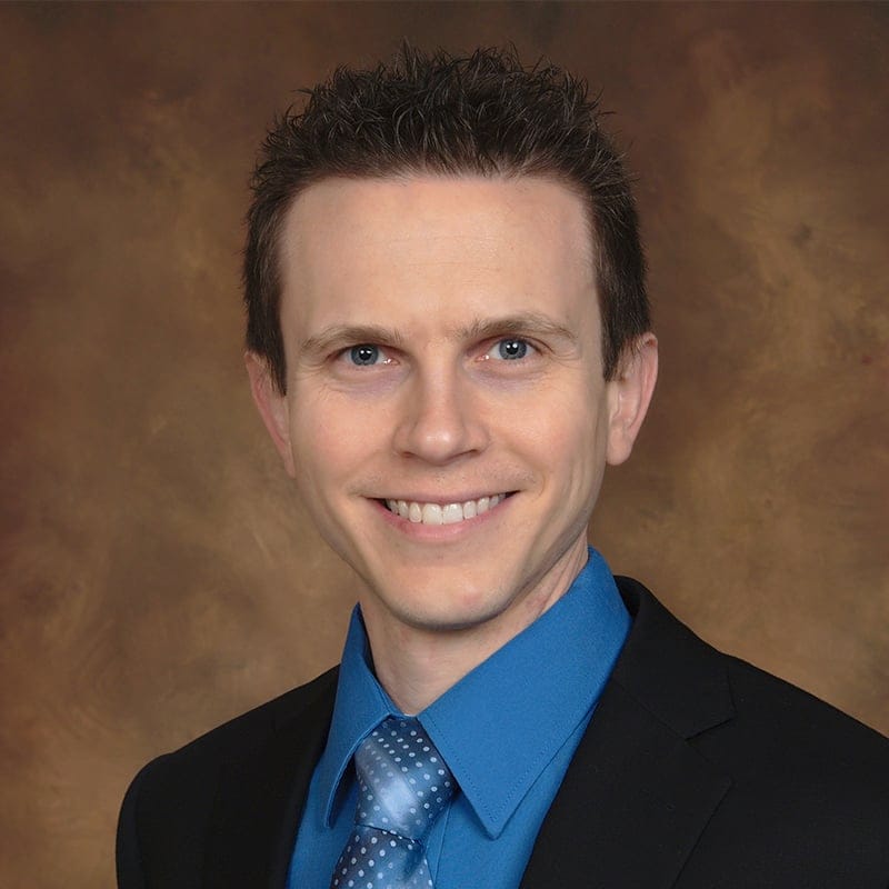 Headshot of Todd Rickett, FAAD, MD, board-certified dermatologist at Forefront Dermatology