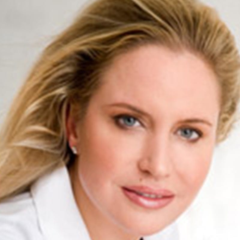 Headshot of Saundra Seaman, FAAD, MD, board-certified dermatologist at Forefront Dermatology
