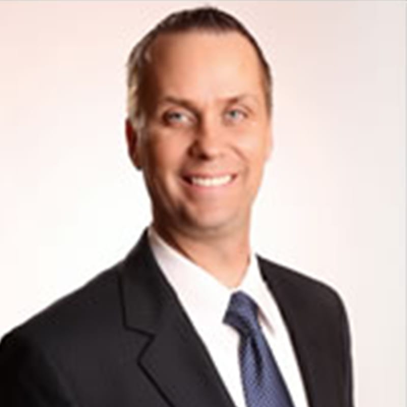 Headshot of Ronald Johnston, ABD, FAAD, MD, board-certified dermatologist at Advanced Dermatology & Skin Care Centre