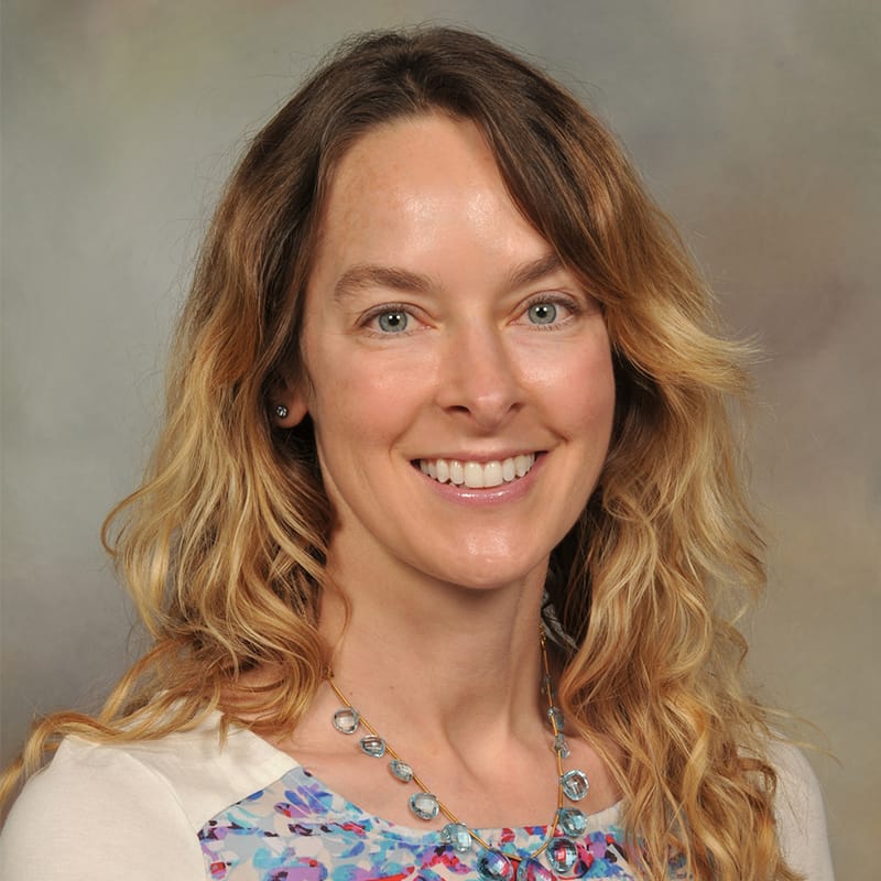 Headshot of Sarah Taylor, FAAD, MD, board-certified dermatologist at Forefront Dermatology