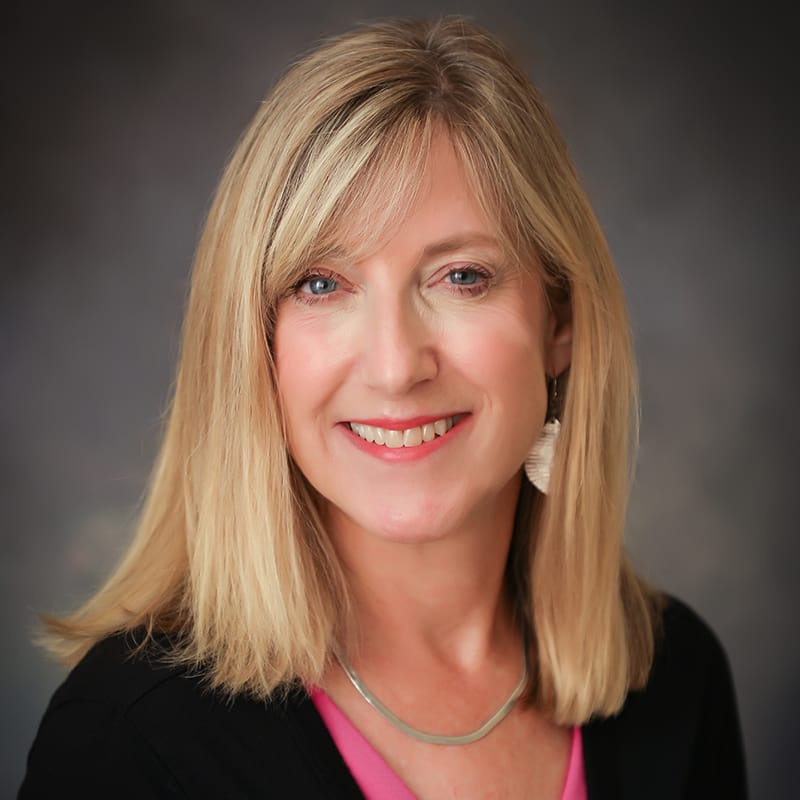 Headshot of Christine Benigar, PA-C, certified physician assistant at Forefront Dermatology