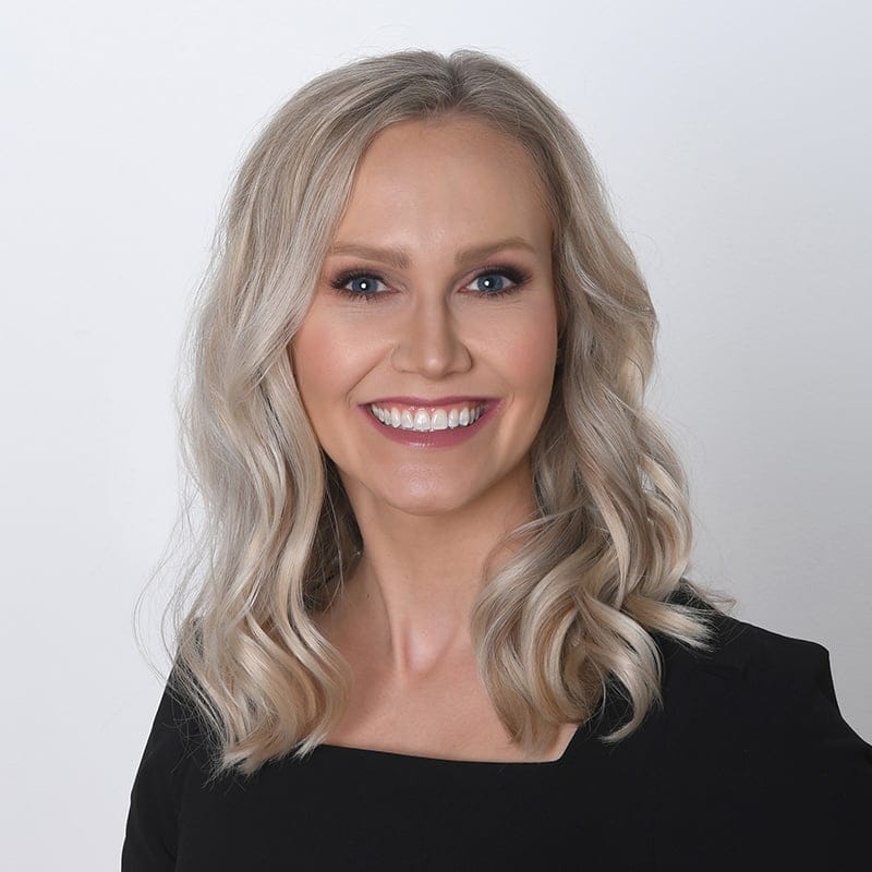 Headshot of Sarah Storm Gross, FAAD, MD, board-certified dermatologist at Forefront Dermatology