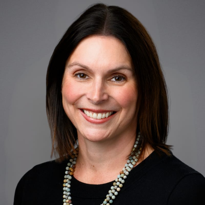 Headshot of Samantha E. Hill, FAAD, MD, board-certified dermatologist at Forefront Dermatology