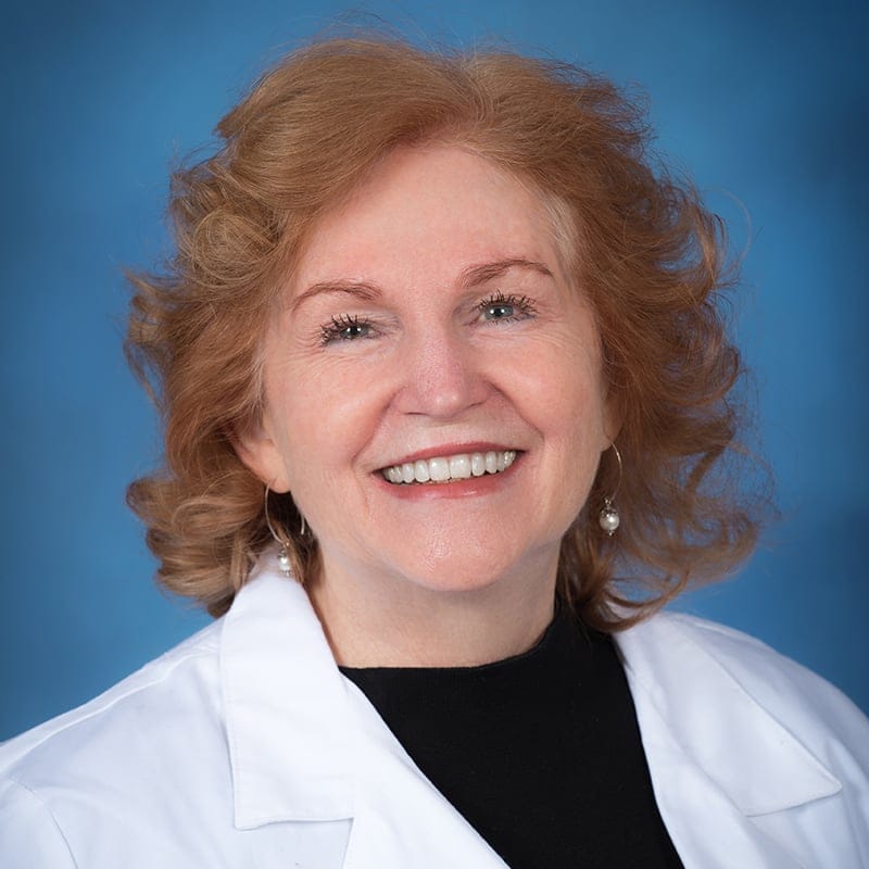 Headshot of Elizabeth Burke, FAAD, MD, board-certified dermatologist at Forefront Dermatology
