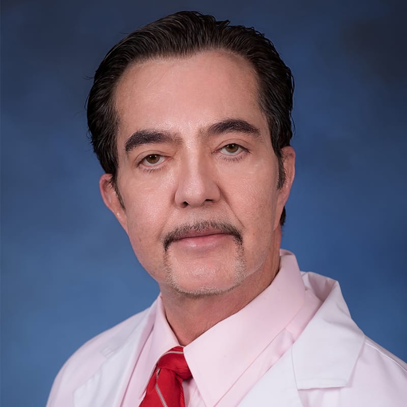 Headshot of Howard Hines, FAAD, MD, board-certified dermatologist at Forefront Dermatology