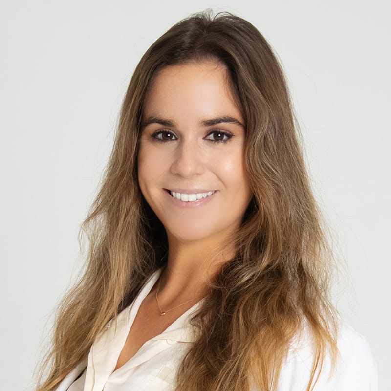 Headshot of Amanda McIntire Daggett, FAAD, MD, board-certified dermatologist at Forefront Dermatology