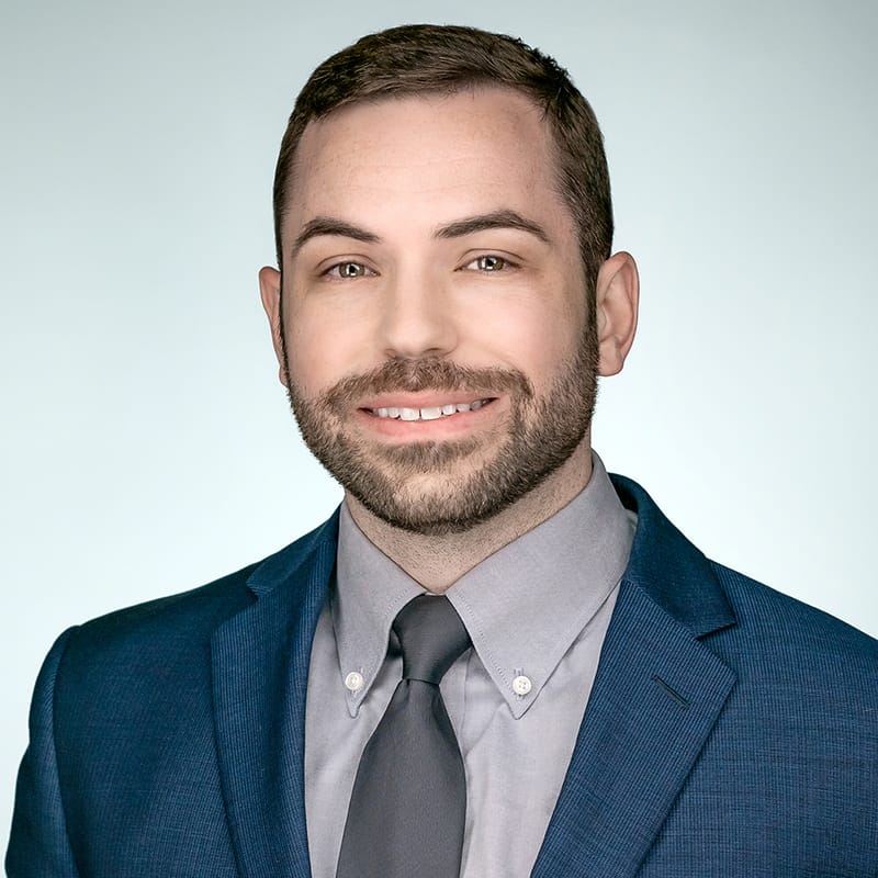 Headshot of Shane Grace, FAAD, MD, board-certified dermatologist at Forefront Dermatology
