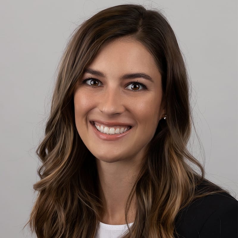 Headshot of Kirsten E. Dickinson, FAAD, MD, board-certified dermatologist at Forefront Dermatology
