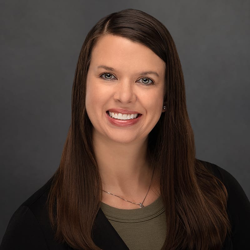 Headshot of Lacey Schwanebeck, DNP, APNP, FNP-BC, RN, family nurse practitioner at Forefront Dermatology