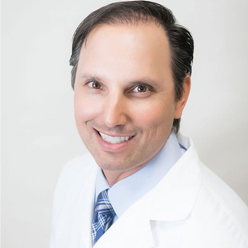Headshot of John Perrotto, DO, board-certified dermatologist at Skin Center