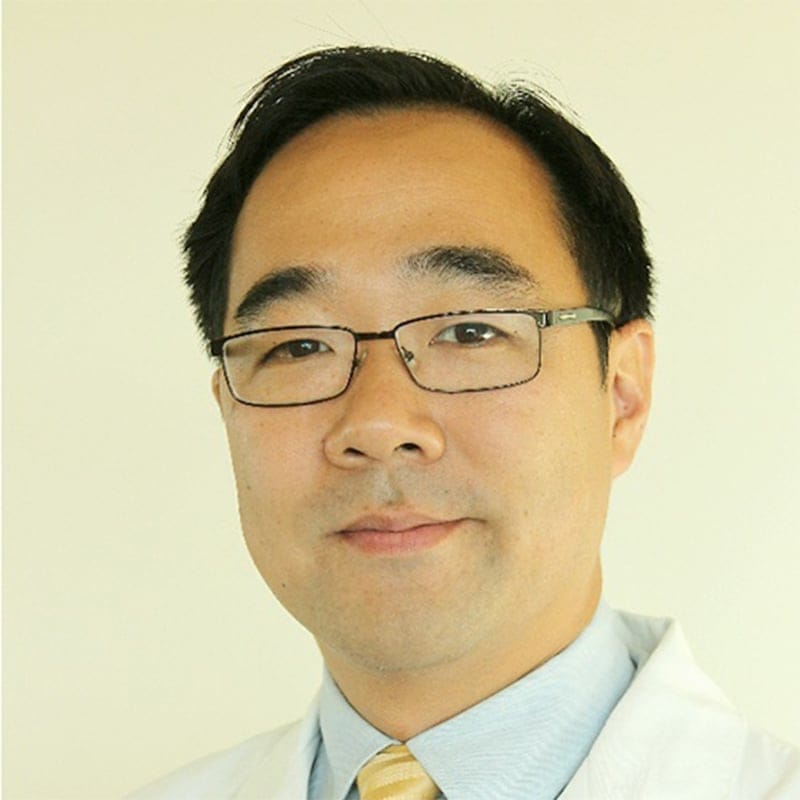 Headshot of Aric Park, MD, board-certified otolaryngologist at Forefront Dermatology