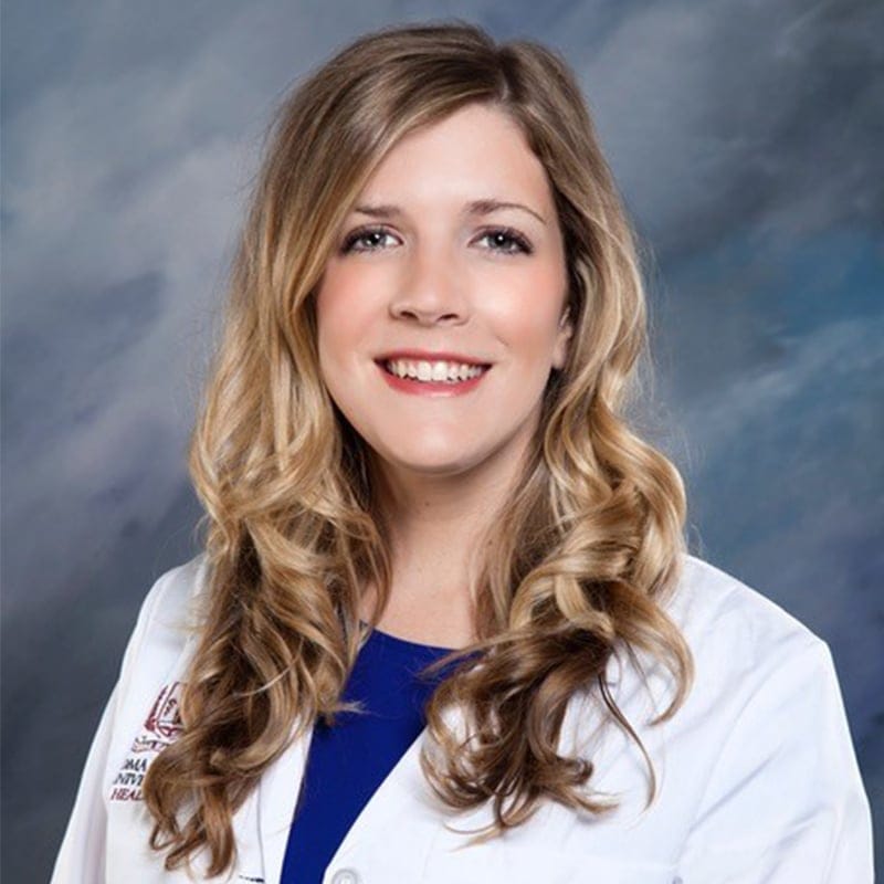 Headshot of Lindsey Goddard, FAAD, FACMS, MD, board-certified dermatologist at Forefront Dermatology