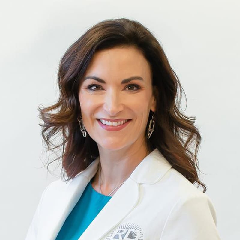 Headshot of Amanda Friedrichs, MD, board-certified dermatologist at Radiant Dermatology