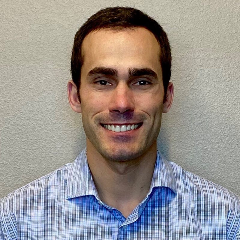 Headshot of Charles Schultz, MD, board-certified dermatopathologist at Forefront Dermatology