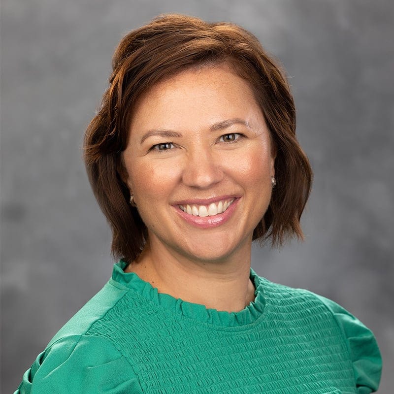 Headshot of Erin Devanney, FNP-BC, family nurse practitioner at Forefront Dermatology