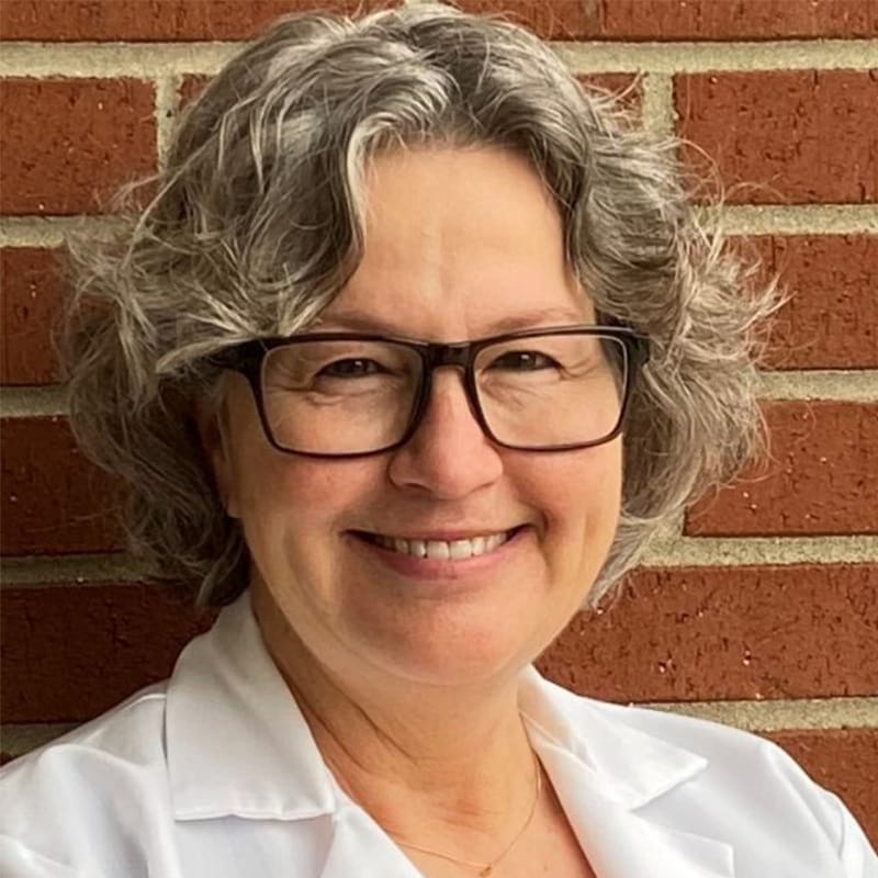 Headshot of Denise L. Puthuff, MD, board-certified dermatologist at Brownsboro Dermatology