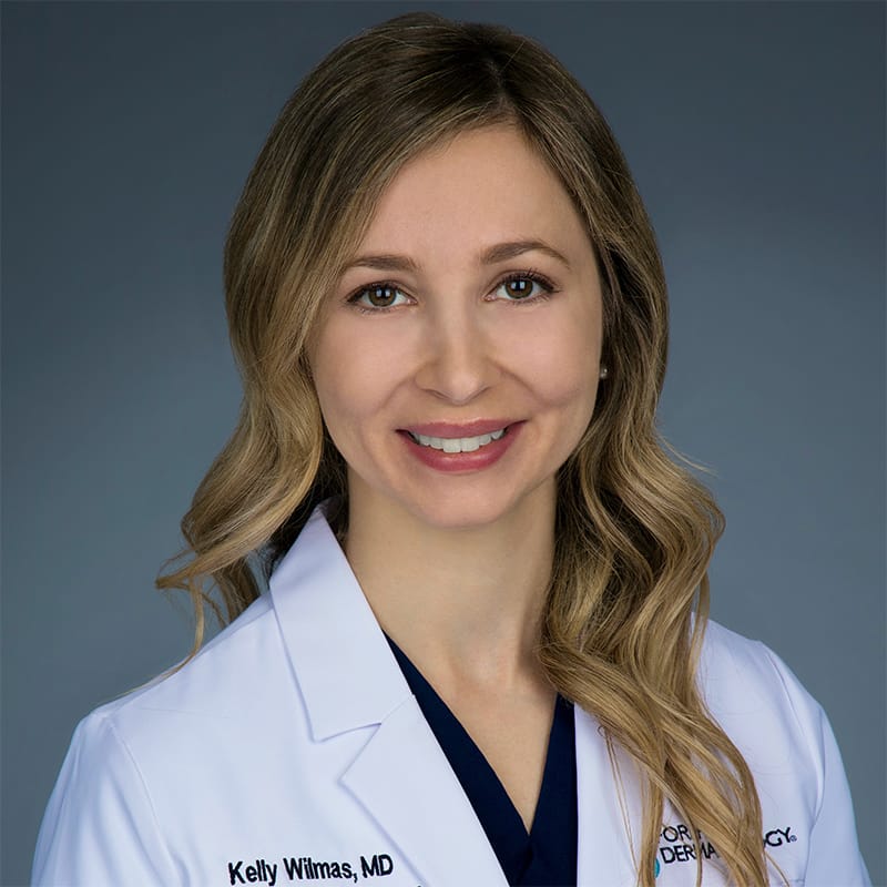 Headshot of Kelly Wilmas, FAAD, MD, board-certified dermatologist at Forefront Dermatology