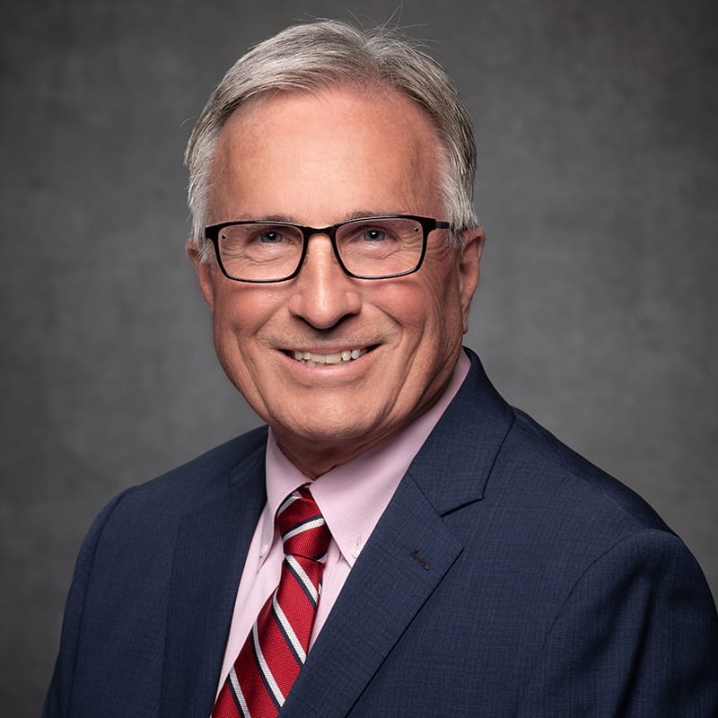 Headshot of John DeSpain, FAAD, MD, board-certified dermatologist at Forefront Dermatology