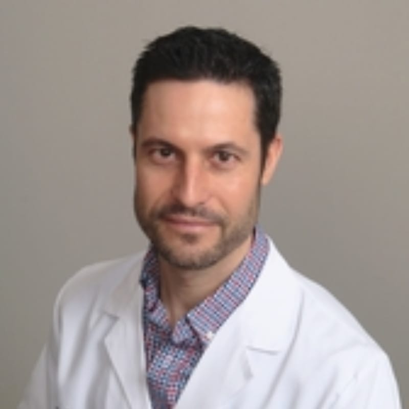 Headshot of Jason Van Ittersum, MD, board-certified dermatologist at Lakeshore Dermatology Laser & Medical Spa
