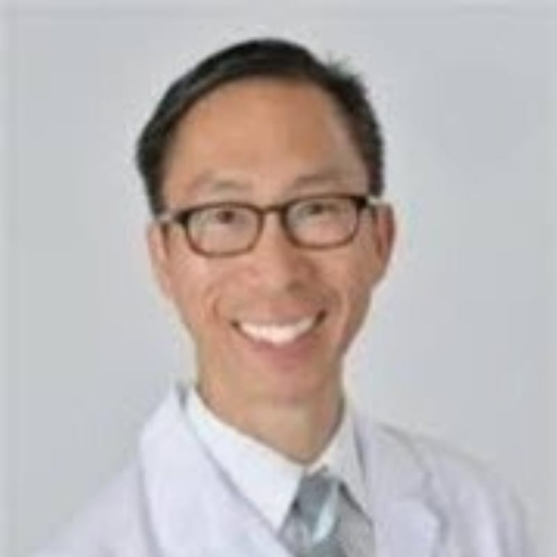Headshot of Timothy S. Wang, MD, board-certified dermatologist at Lakeshore Dermatology Laser & Medical Spa