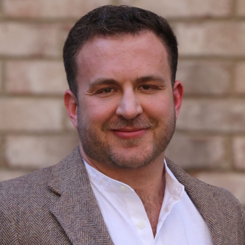 Headshot of William Farmer, FAAD, MD, board-certified dermatologist at Forefront Dermatology