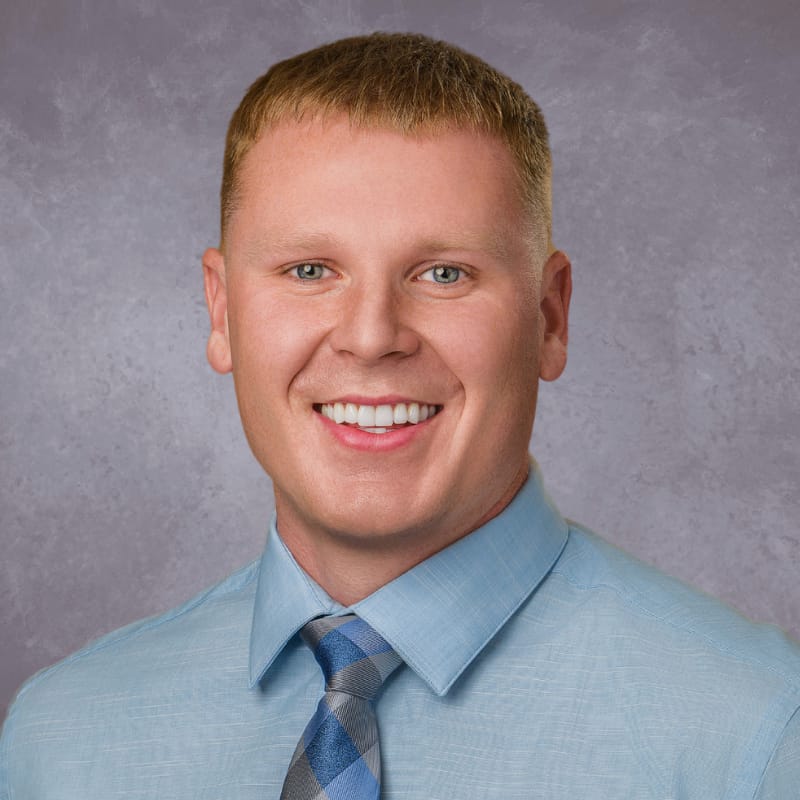 Headshot of Dalton Menke, PA-C, certified physician assistant at Forefront Dermatology
