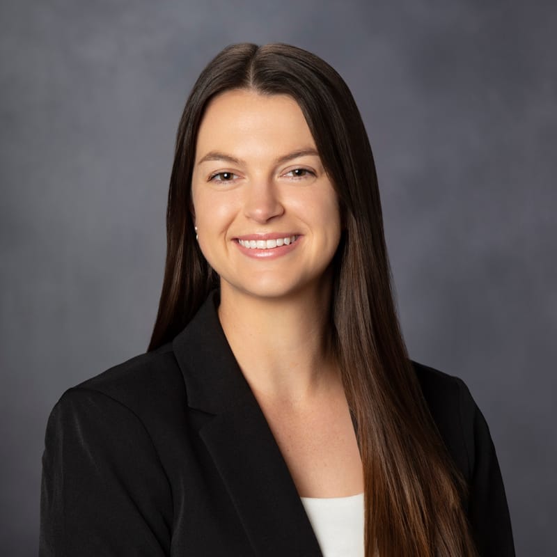 Headshot of Anna Komer Mulac, NP, family nurse practitioner at Forefront Dermatology