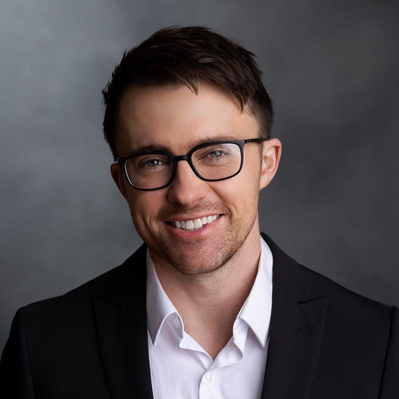 Headshot of Elliot Baker Franczek, FAAD, MD, board-certified dermatologist at Forefront Dermatology
