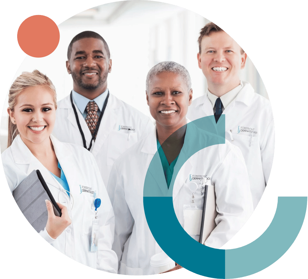 Forefront Dermatology provider examining a patient