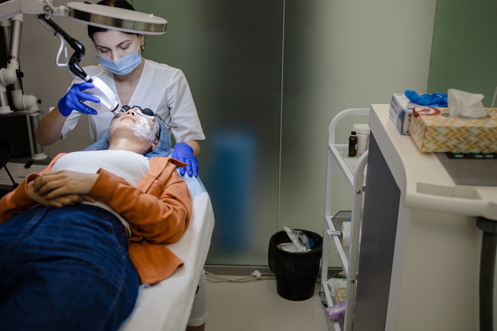 woman-on-table-receiving-laser-surgery-for-facial-scar